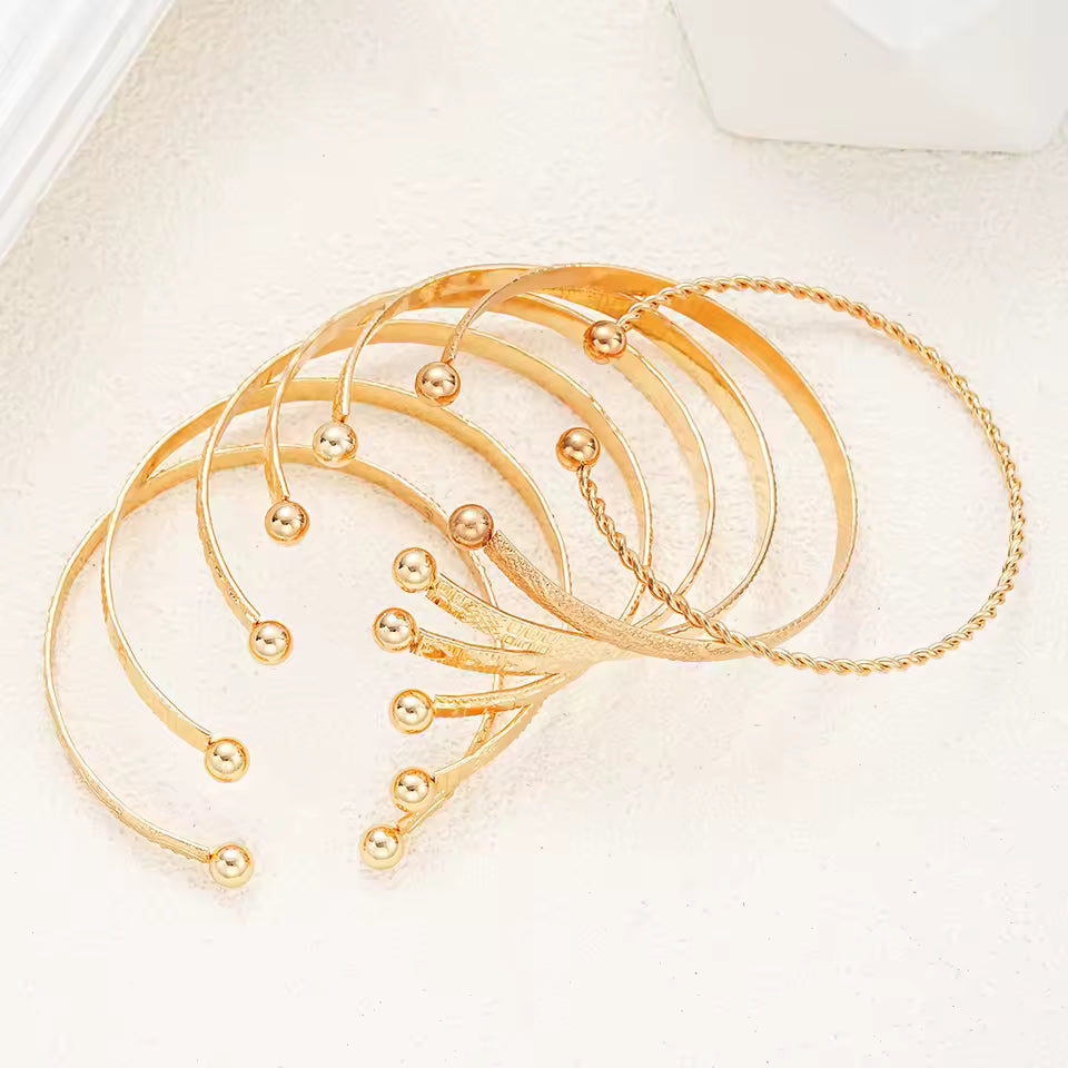 Gold Printed Bangle Set – 7-Piece Layering Bracelets